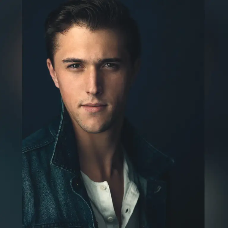 Billy Rude professional headshot with moody dark background and directional lighting creating dimensional portrait, captured by 312 Elements Headshot Photography, headshot photographer in Chicago, IL