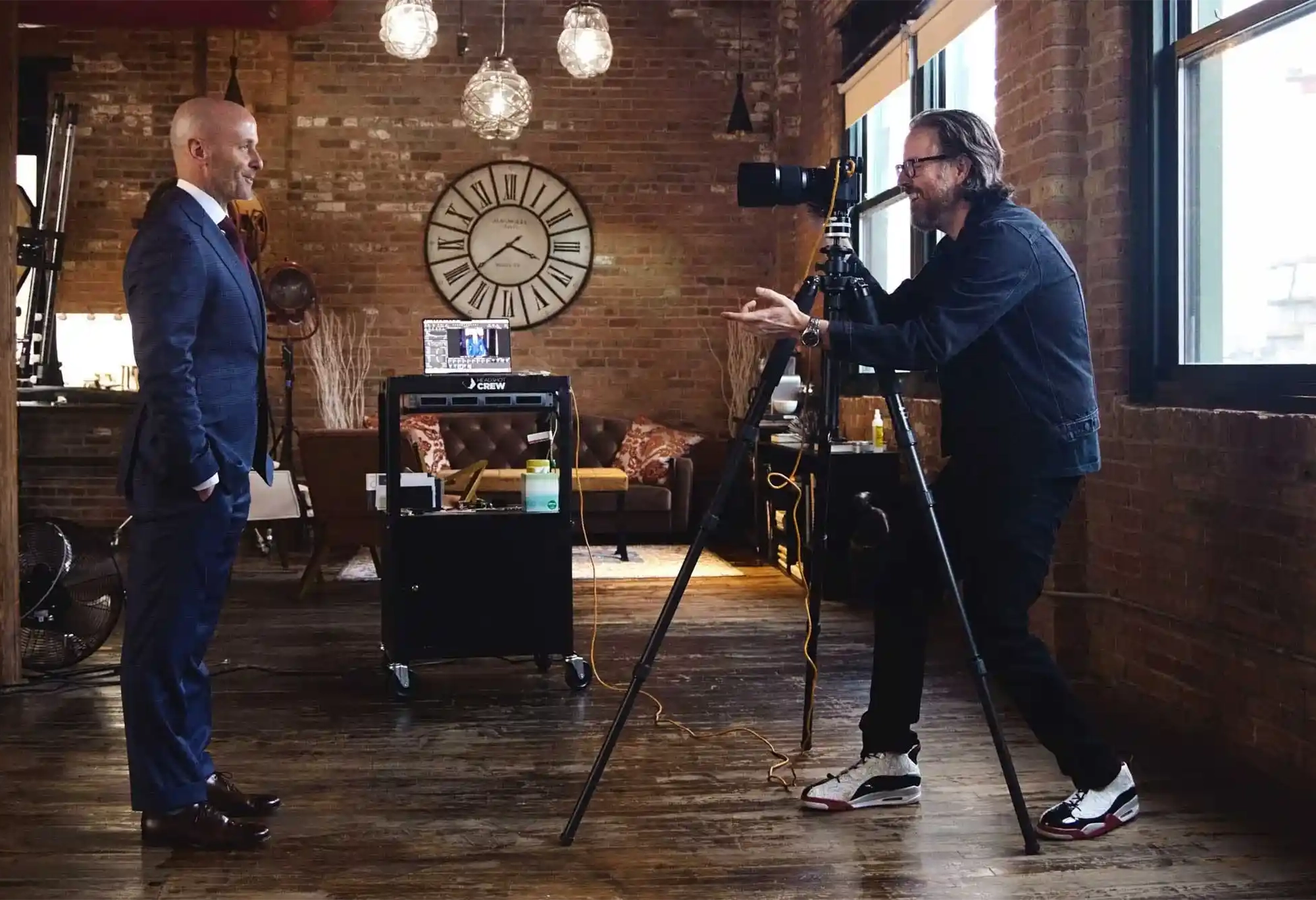 Behind the scenes of Michael Schacht photographing a professional LinkedIn headshot session in Chicago studio, 312 Elements Headshot Photography