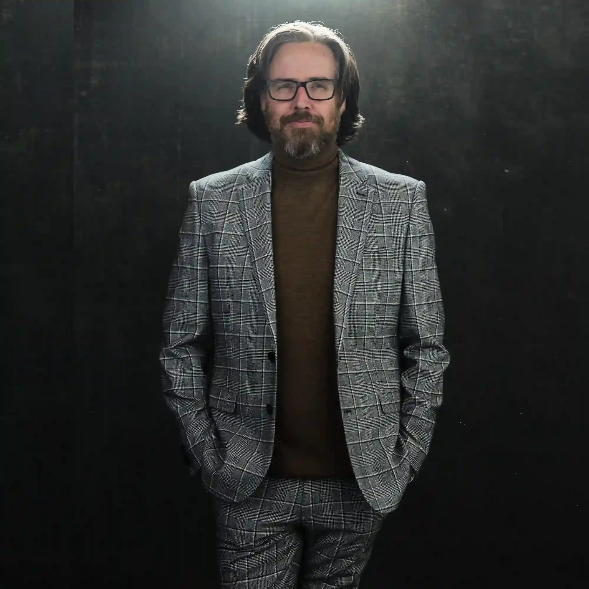 Photograph of Chicago Headshot Photographer Michael Schacht wearing plaid suit